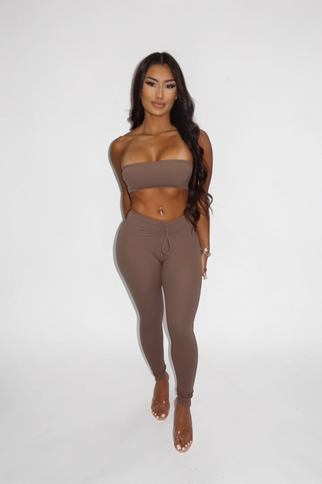 GLAMORZ brown scrunch leggings and matching strapless crop top worn by a woman against a white background