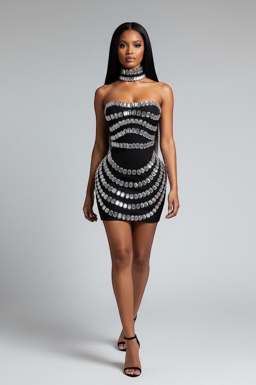 Model wearing GLAMORZ black strapless Cindy mini dress with crystal embellishments and matching choker