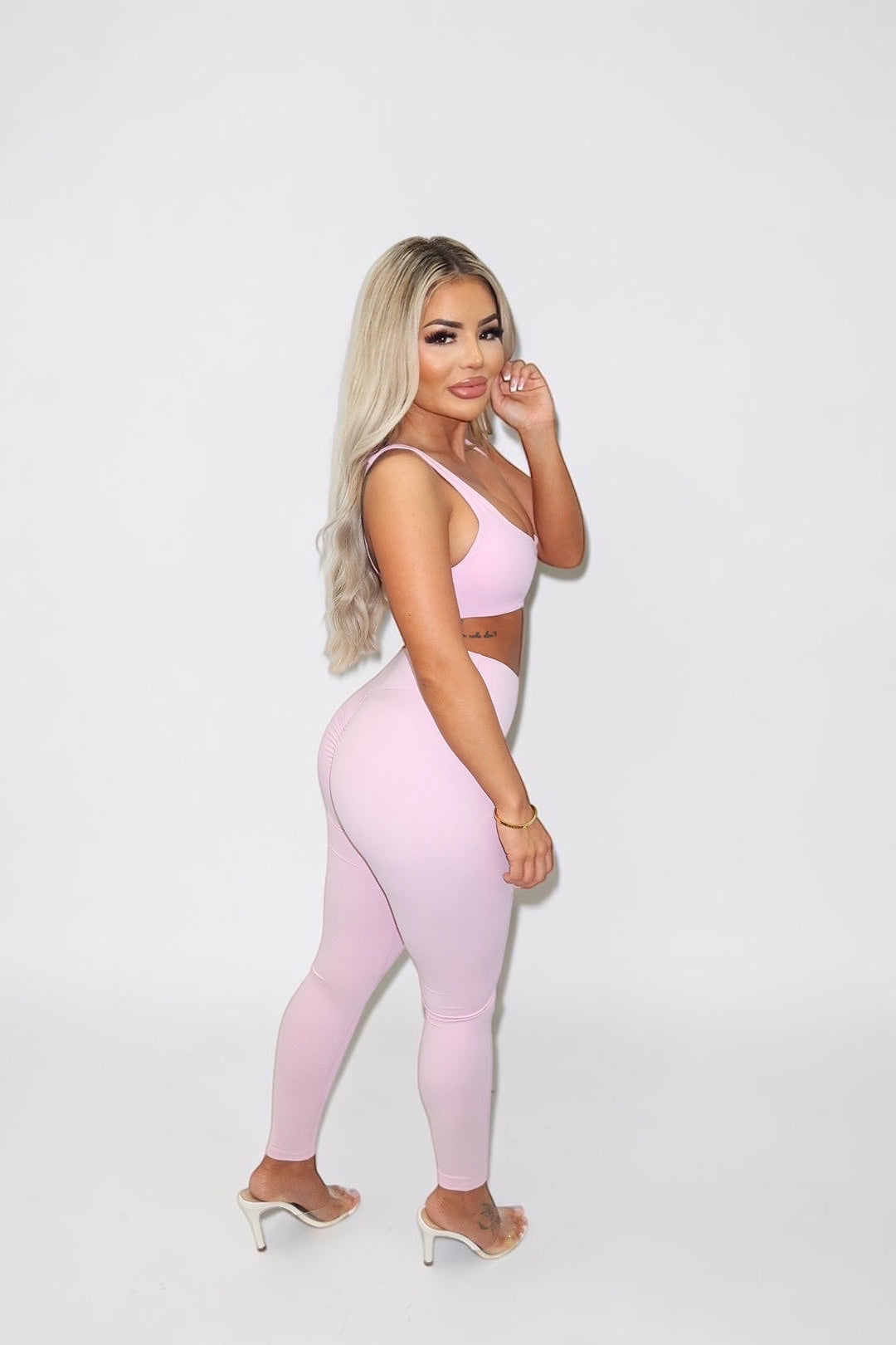 GLAMORZ Simplicity Bra in baby pink worn by a blonde model with matching high-waisted leggings against a white wall